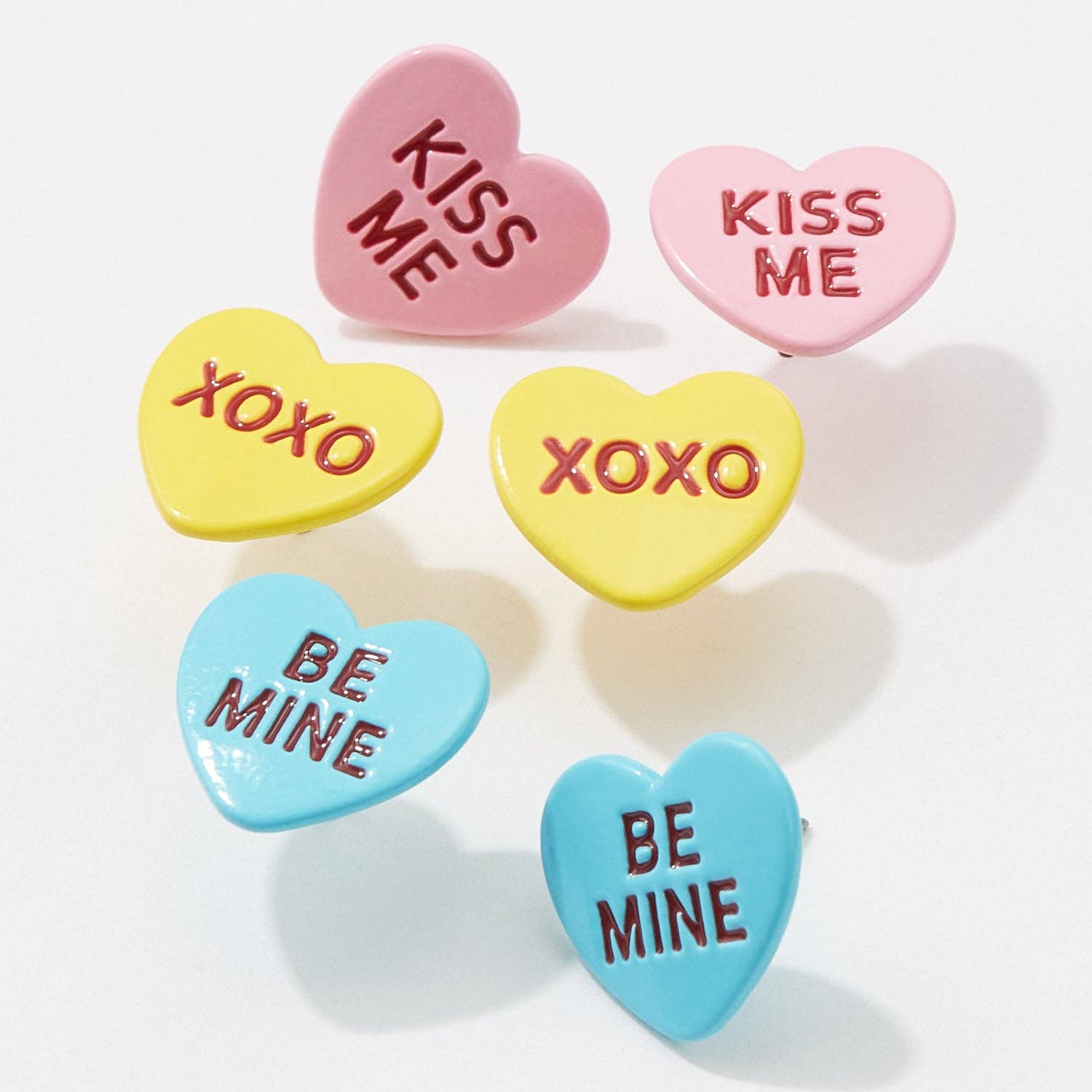 A Set of Three Loving Phrase Post Earrings
