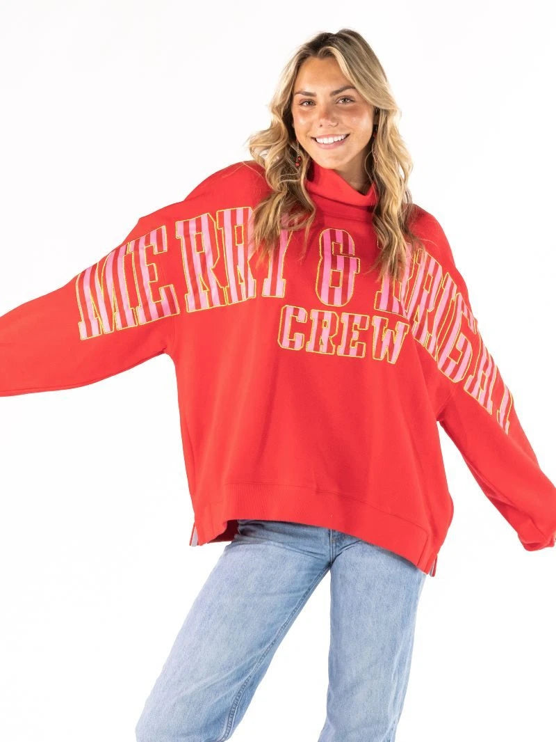 Merry & Bright Crew mock neck sweatshirt worn, showing the pink lettering