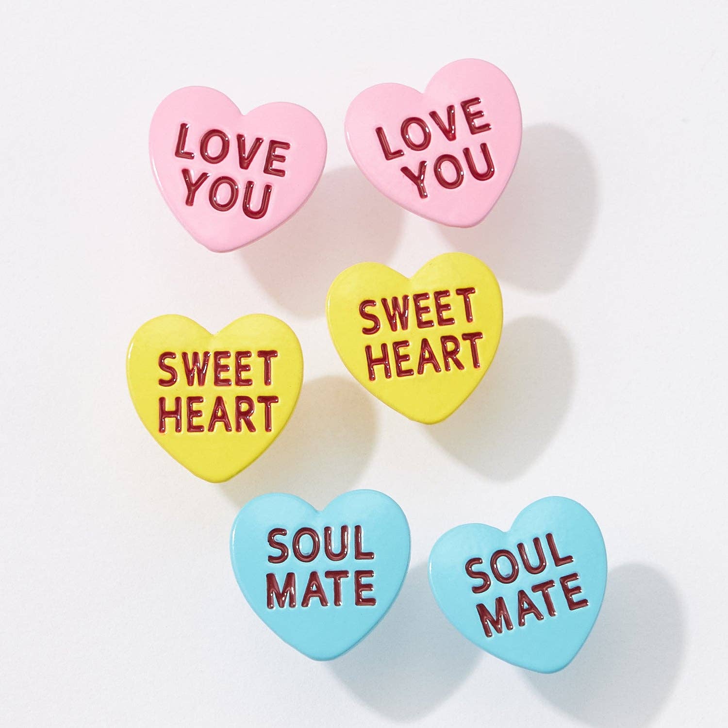 A Set of Three Loving Phrase Post Earrings