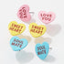 A Set of Three Loving Phrase Post Earrings